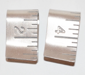 UNUSUAL STERLING TAPEMEASURE CUFF LINKS